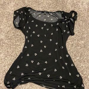 Black shirt with white hearts